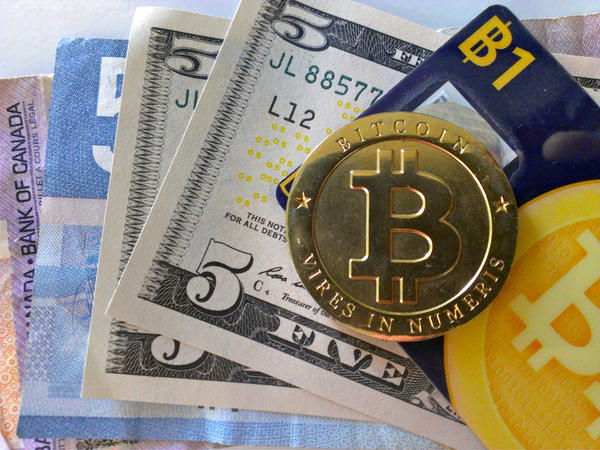 Bitcoin – wirtualna waluta, realny zysk?